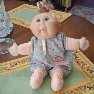 Doll in Floral Romper